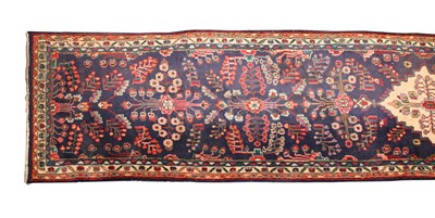 Lot 669 - A Persian runner