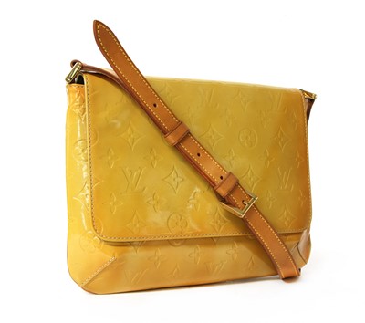 Lot 27 - A Louis Vuitton yellow monogrammed Vernis leather 'Thompson Street' bag