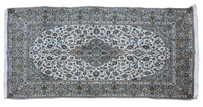 Lot 895 - A Persian Kashan rug