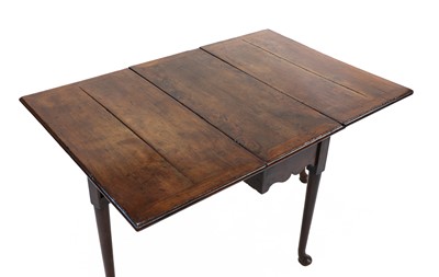 Lot 371 - A yew wood drop-leaf supper table