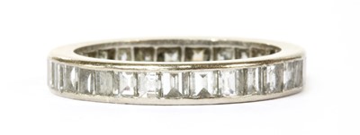 Lot 100 - A white gold full eternity ring