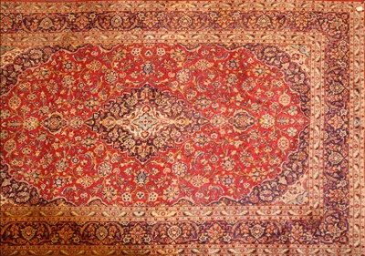 Lot 670 - A Persian Kashan carpet