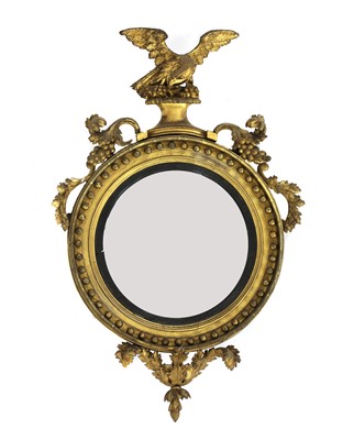 Lot 842 - A Regency giltwood convex mirror