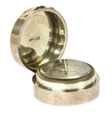 Lot 276 - A sterling silver cased travel barometer by Asprey