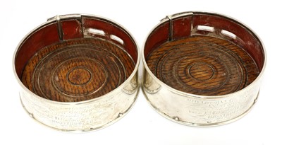 Lot 41 - A pair of Scottish William IV silver presentation coasters in the form of dog collars