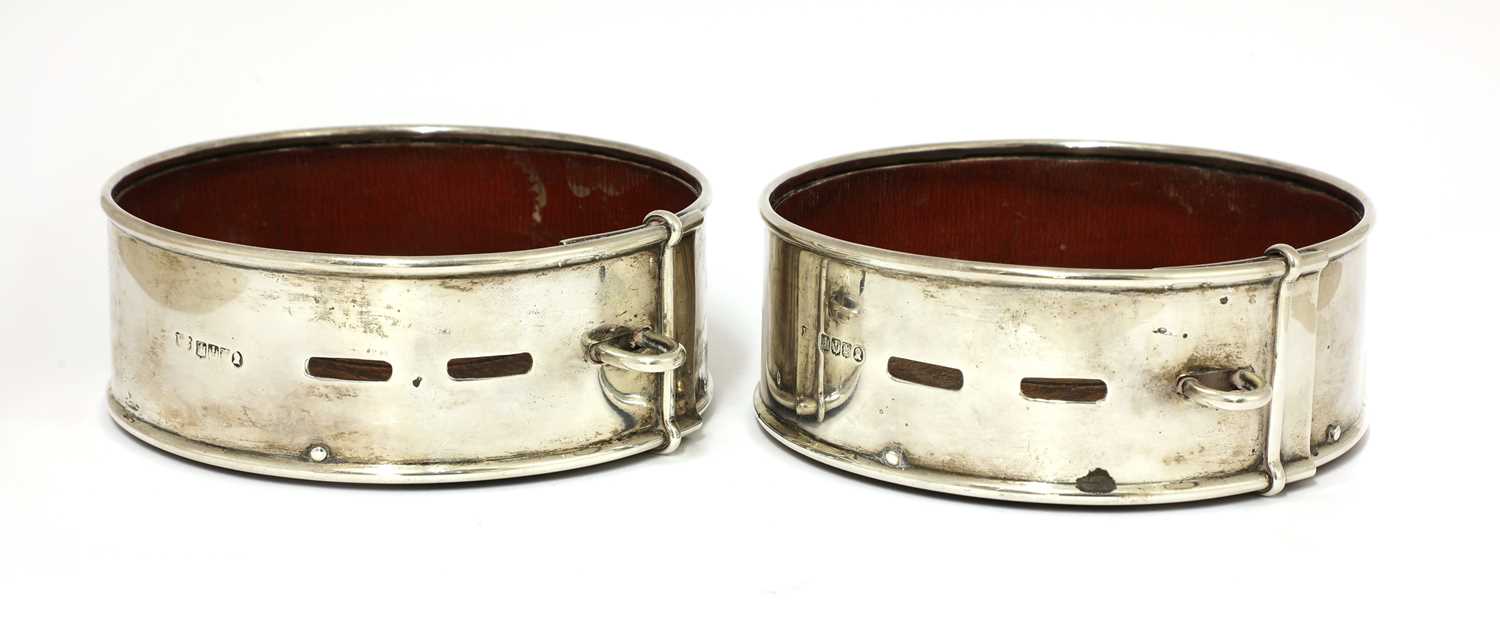 Lot 41 - A pair of Scottish William IV silver presentation coasters in the form of dog collars