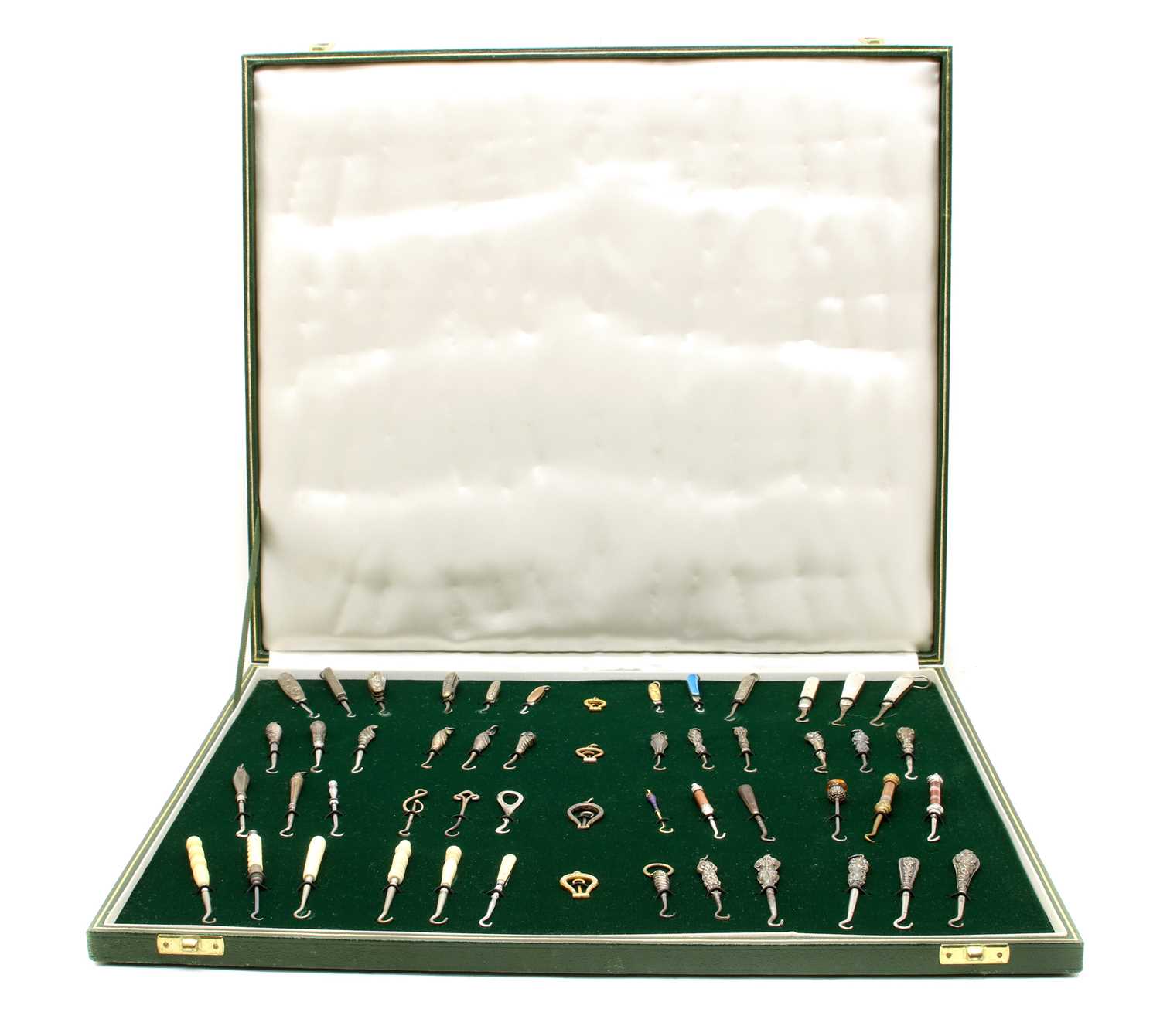 Lot 440 - A cased collection of button hooks with various handles
