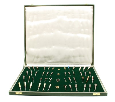 Lot 440 - A cased collection of button hooks with various handles