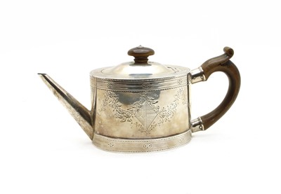 Lot 325 - A George III silver teapot of ovoid form