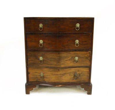 Lot 718 - A Bengal rosewood 'Sheesham wood' serpentine chest of drawers