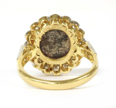 Lot 21 - A gold boulder opal and diamond cluster ring