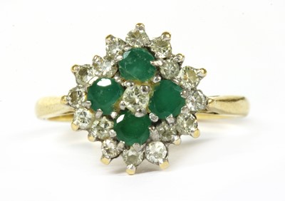 Lot 154 - A gold diamond and emerald quatrefoil cluster ring