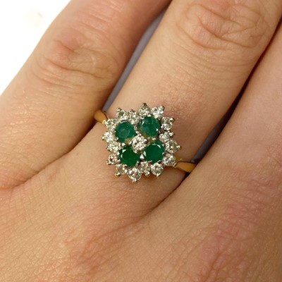 Lot 154 - A gold diamond and emerald quatrefoil cluster ring