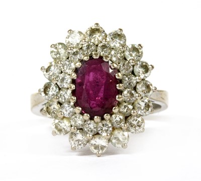 Lot 45 - A white gold ruby and diamond cluster ring