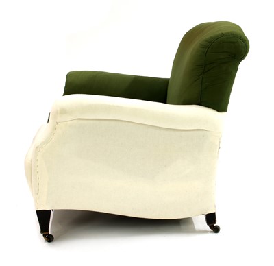Lot 477 - An upholstered easy armchair