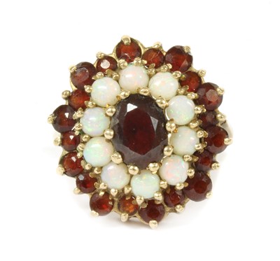 Lot 379A - A 9ct gold garnet and opal cluster ring