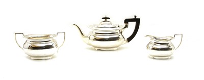 Lot 41 - A silver three piece tea set