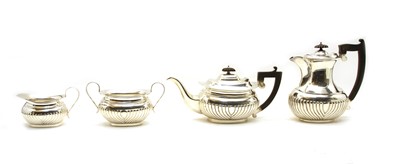 Lot 30 - A silver four piece tea and coffee set