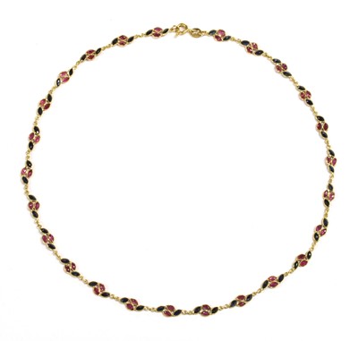 Lot 370 - A gold ruby and sapphire necklace