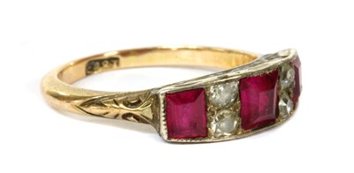 Lot 324 - A gold and silver, synthetic ruby and diamond ring