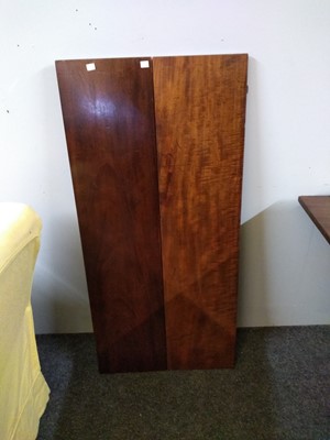 Lot 455 - A Georgian triple pillar mahogany dining table