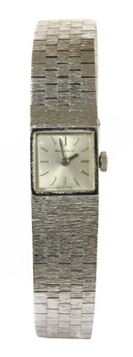 Lot 174 - A ladies' 9ct white gold Bueche Girod mechanical bracelet watch, c.1970