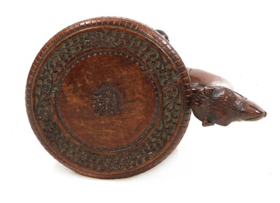 Lot 878 - An Indian carved teak occasional table