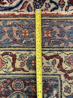 Lot 767 - A large Persian Tabriz carpet