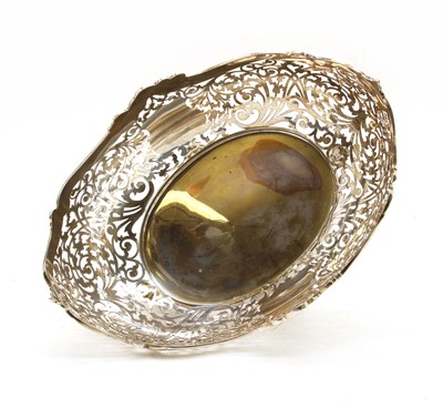 Lot 285 - A silver bread basket of oval form