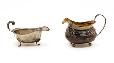 Lot 261 - A George III silver cream jug of ovoid form