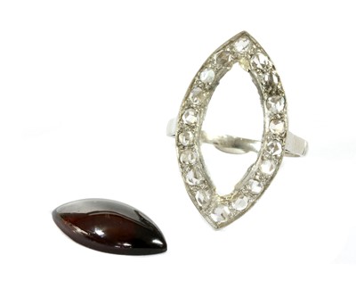Lot 380 - A platinum garnet and diamond navette cluster ring