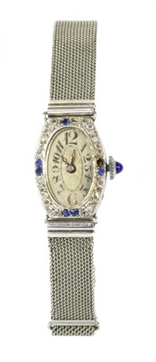 Lot 432 - A French Art Deco white gold sapphire and diamond cocktail watch