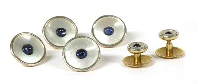 Lot 315 - A set of gold sapphire and mother-of-pearl dress studs