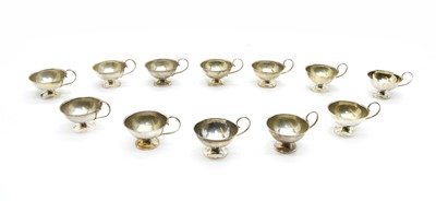 Lot 295 - A set of twelve Swedish silver tot cups