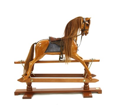 Lot 80A - A large hardwood rocking horse by Stevenson Brothers