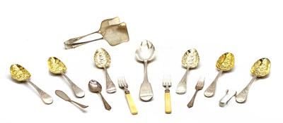Lot 268 - A collection of silver flatware to include a Georgian basting spoon