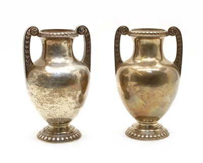 Lot 830 - A pair silver twin-handled urns