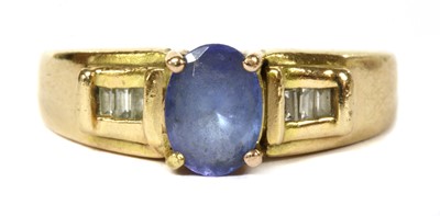 Lot 374 - A gold iolite and diamond ring