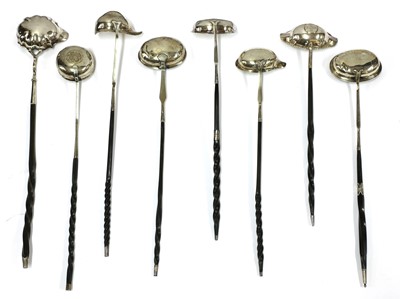Lot 36 - A collection of eight silver toddy ladles