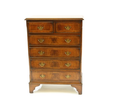 Lot 334 - A George III style inlaid mahogany chest of drawers