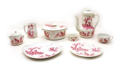 Lot 429 - A large Limoges pink toile part dinner and breakfast service