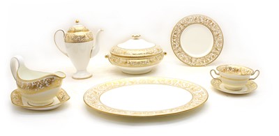 Lot 236 - A Wedgwood 'Gold Florentine' bone china dinner and coffee service