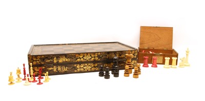 Lot 122 - A 19th century Chinese lacquer folding games board