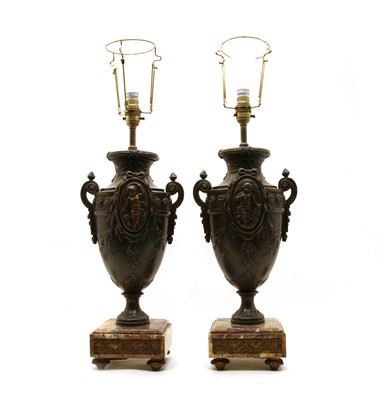 Lot 419 - A pair of French bronzed spelter urn table lamps