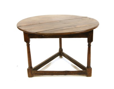 Lot 342 - An 18th century oak ash 'cricket table'