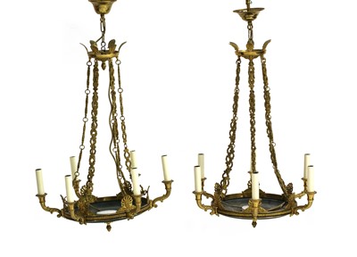 Lot 799 - A pair of French Empire-style 'Serrant' chandeliers