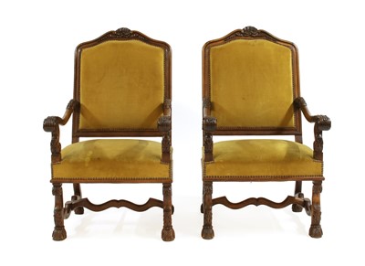 Lot 616 - A pair of French walnut throne chairs