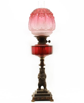 Lot 396 - A Victorian metal bear oil lamp
