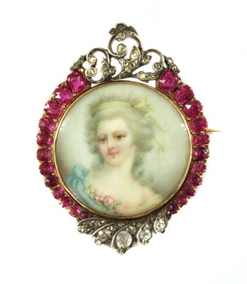 Lot 298 - A gold ruby and diamond set miniature portrait brooch