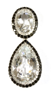 Lot 354 - An 18ct white gold white topaz and diamond pendant